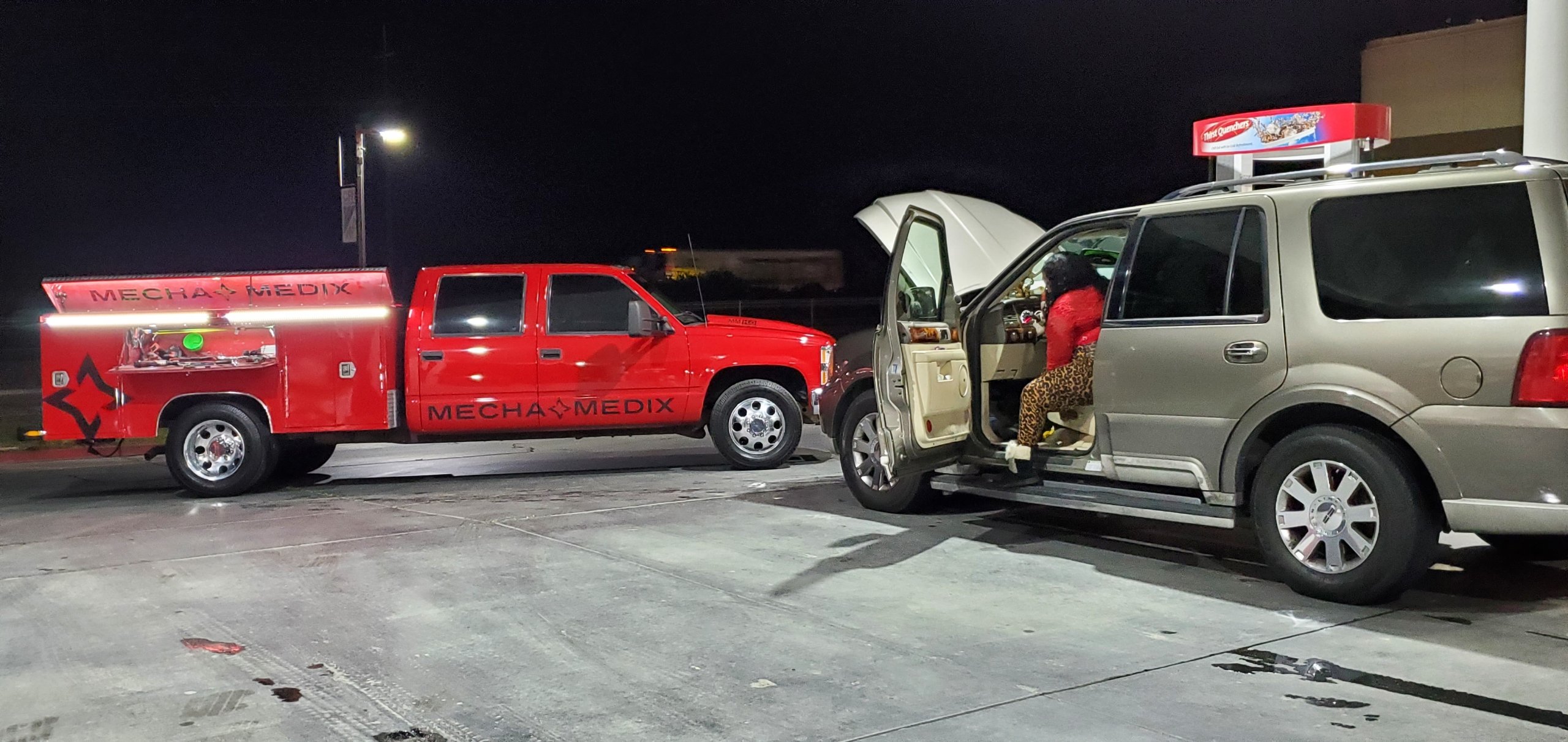 The MechaMedix truck assisting a Bakersfield motorist and a nearby gas station